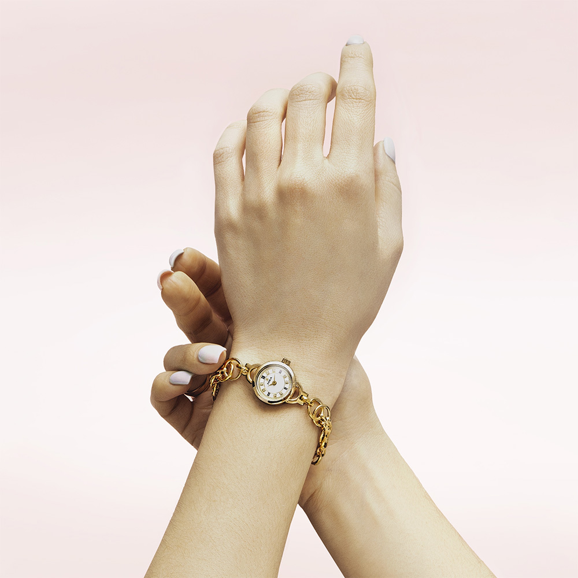 Часы из золочёного серебра Часовой завод Ника 0325.0.91.17H