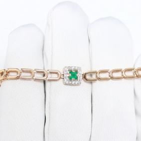 Золотой браслет АЛЬКОР 56868-101 с бриллиантом и изумрудом 56868-101 фото